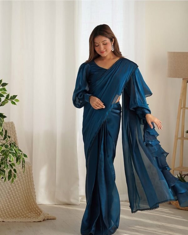 104_9cb82724-2c6c-4d7c-87f6-d7c8d0de57cb-1.jpg Teal Blue Color Jimmy Choo Pre Drapped Saree