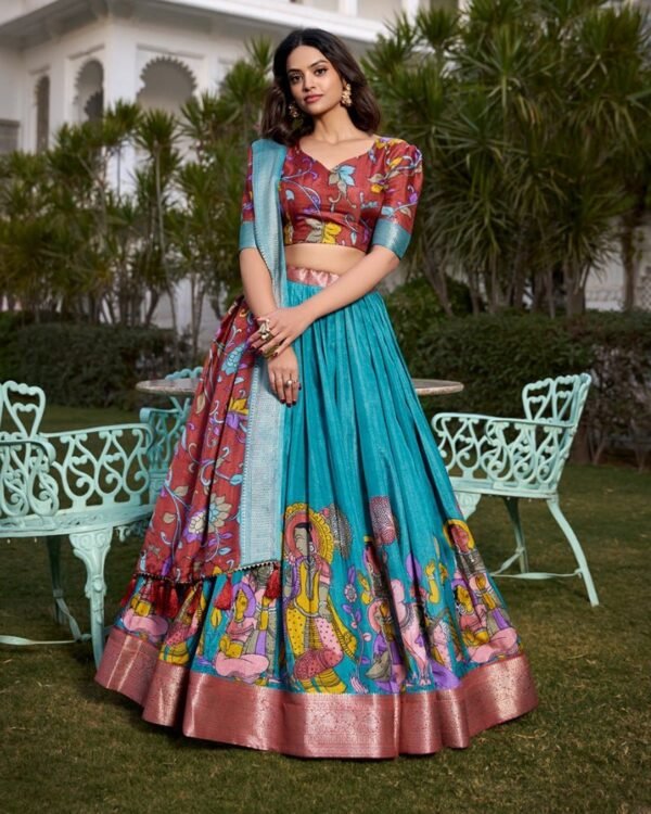 107_e1523224-db16-444e-ac1d-382ecfb87a39-1.jpg Firozi Color Dola Silk Kalamkari Printed Lehenga Choli