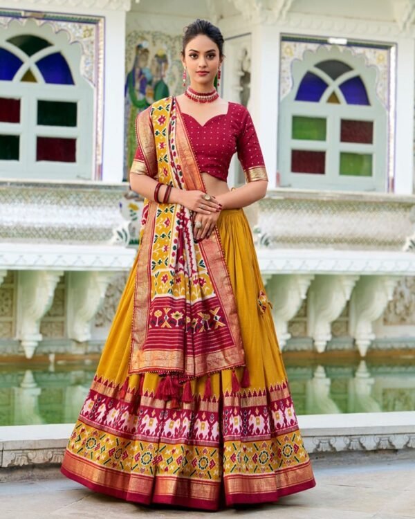 108_1d6a9190-e121-42fe-832a-1125ed876704-1.jpg Mustard Color Tussar Silk Patola Printed Lehenga Choli