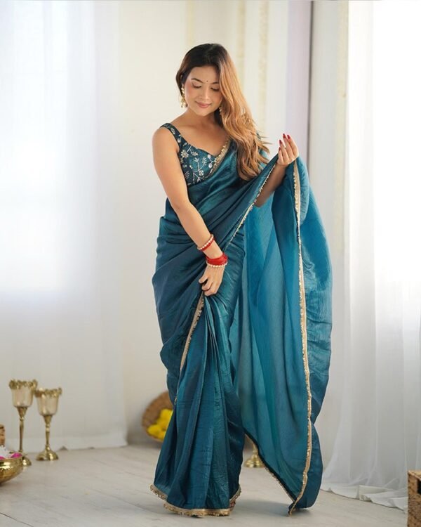 119_0ed41192-54e7-40d8-ac2e-6fe204aa8c36-1.jpg Teal Blue Color Tissue Silk Pre Drapped Saree