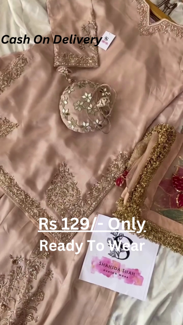5052-1.png Rose Gold Splendor: Embroidered Silk Suit with Potli Bag